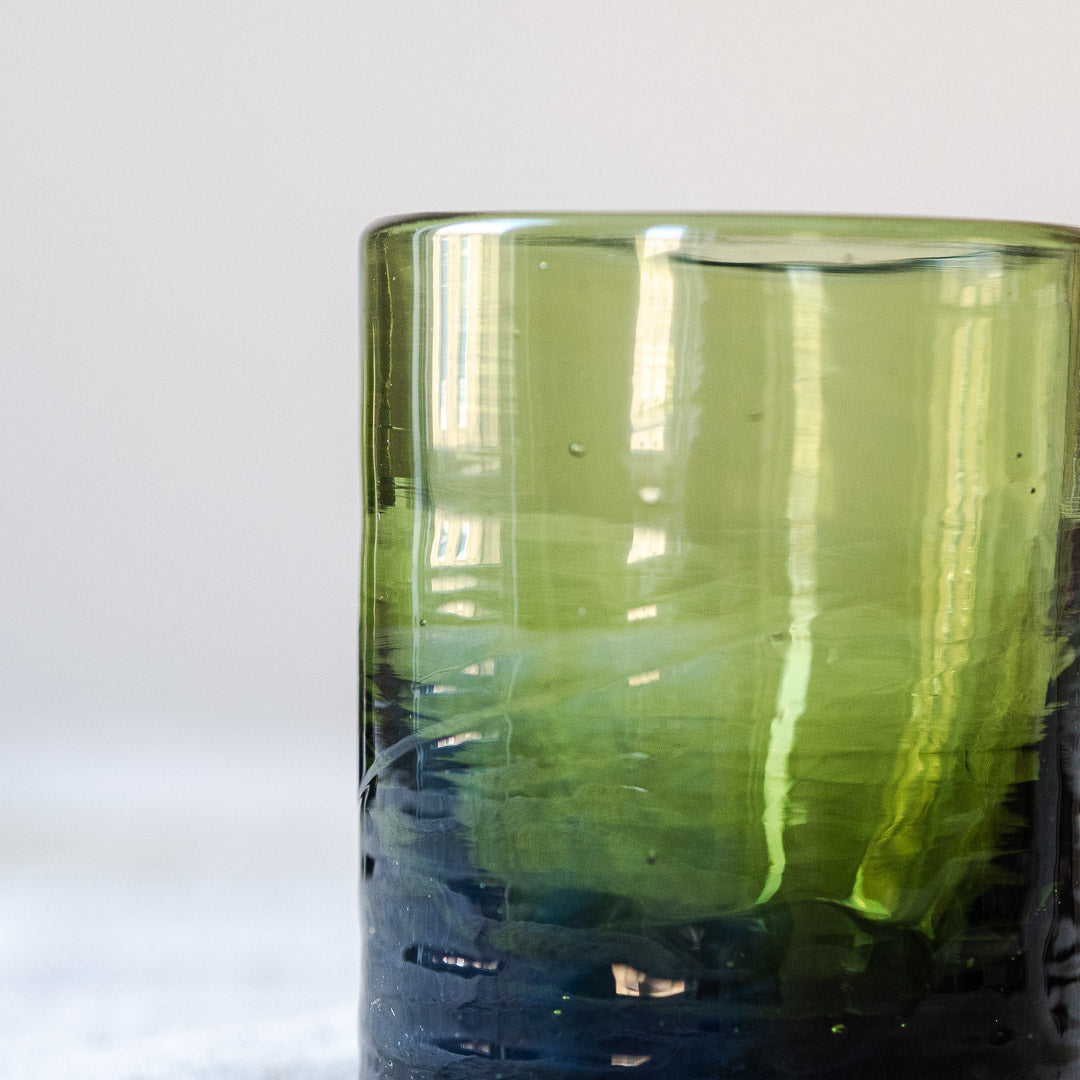 Parisian drinking glass in olive by La Soufflerie