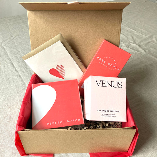 Venus Valentine Gift Box containing Evermore London 'Venus' Candle, 'Perfect Match' Matchbox, Bare Bones Chocolate bar and Foil blocked heart valentine card