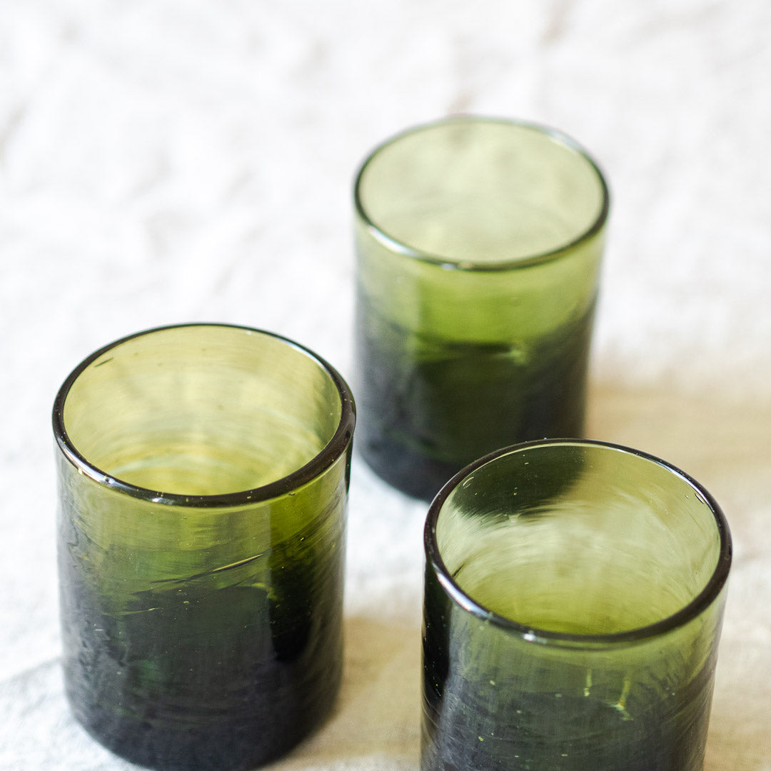 3 olive drinking glasses made by La Soufflerie from recycled glass
